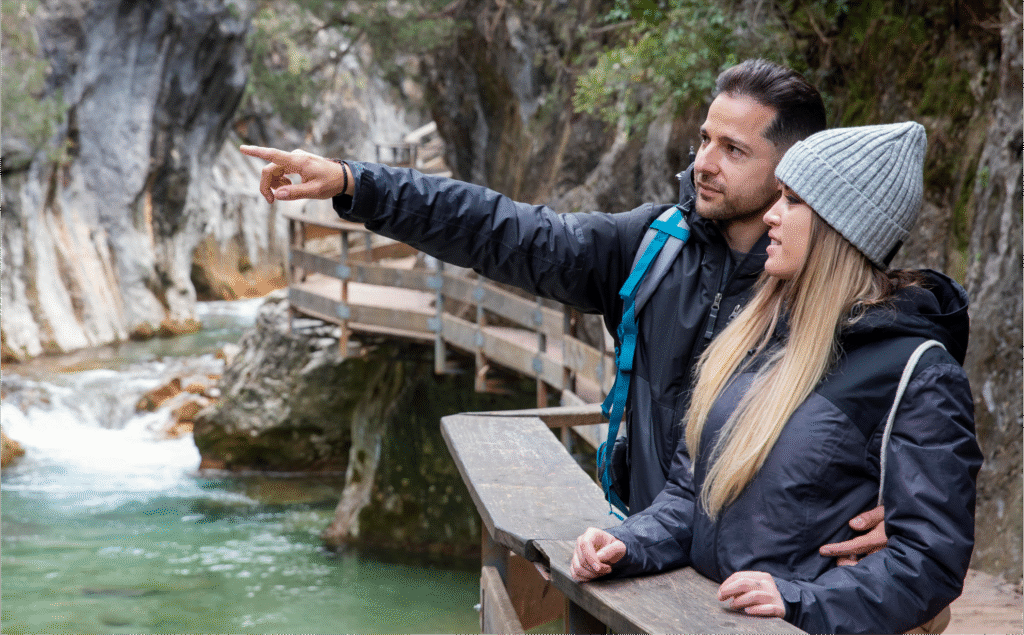 A happy family standing near Lake Saif-ul-Malook on a guided tour.